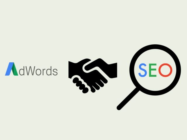 Adwords and SEO with a handshake in the middle for marketing solutions